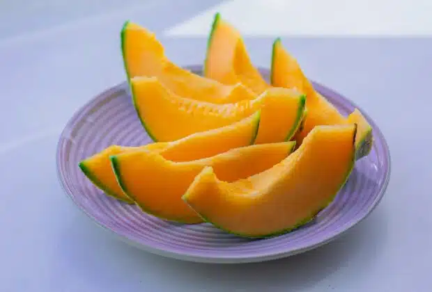 sliced fruit on white ceramic plate